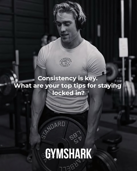 A black and white image of a man holding a weight plate in a gym environment with overlay text prompting engagement from the viewer.